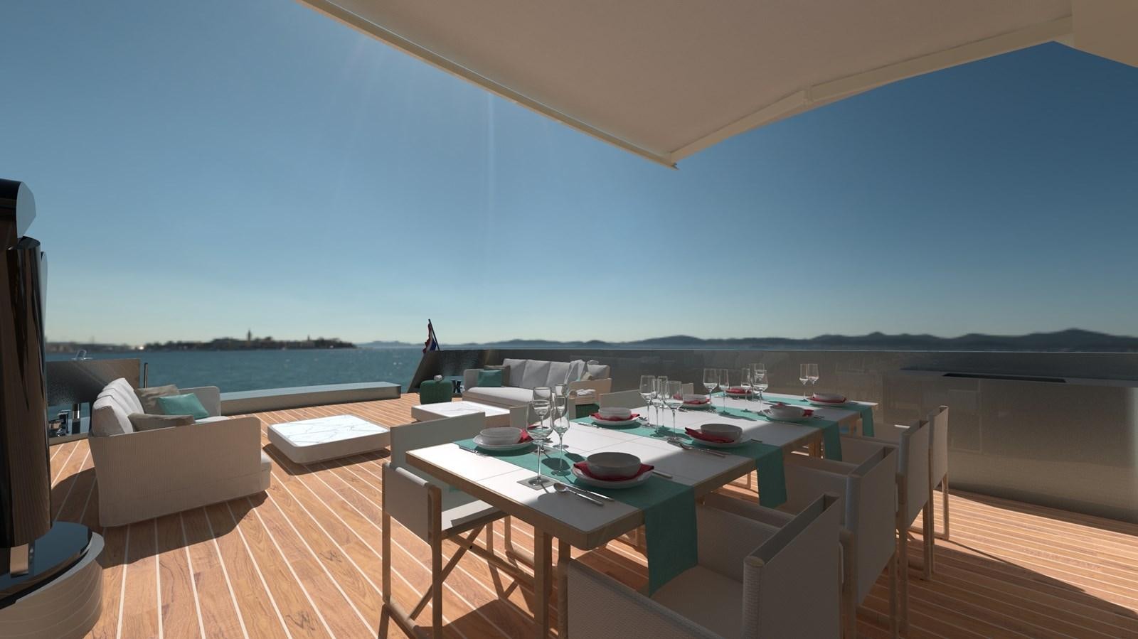a table on a deck aboard CROSSOVER 27M Yacht for Sale