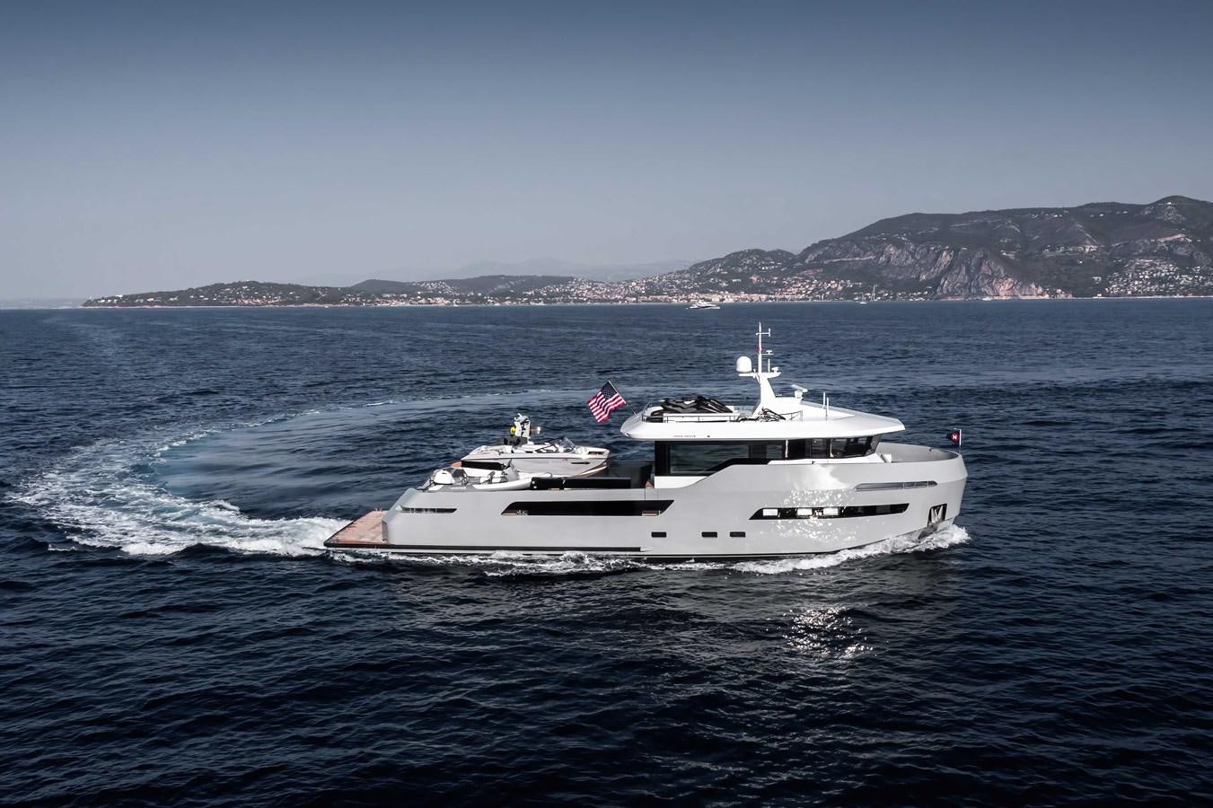 a boat on the water aboard CROSSOVER 27M Yacht for Sale