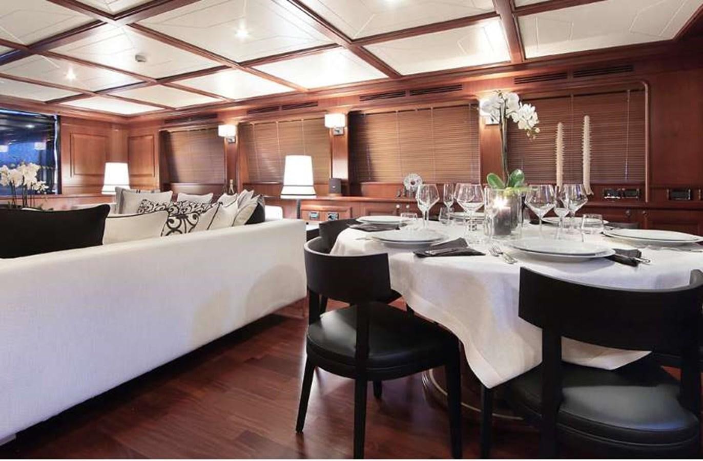 a room with a table and chairs aboard LADY SOUL Yacht for Charter