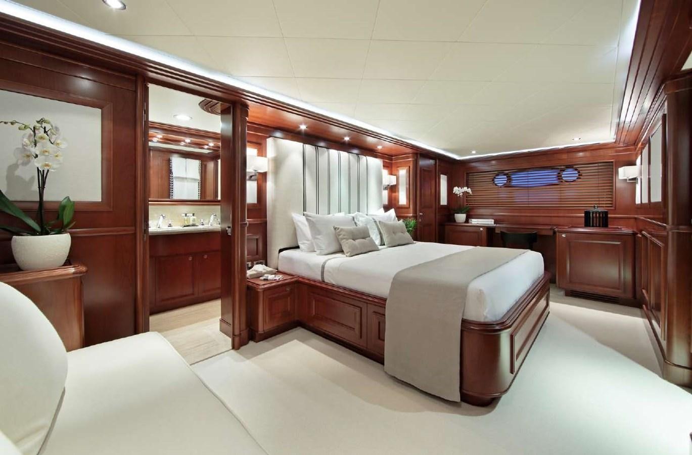 a large bedroom with a bed aboard LADY SOUL Yacht for Charter